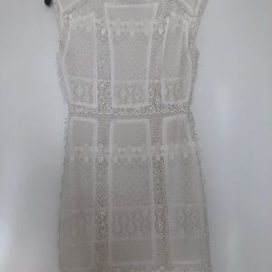 Gorgeous form fitting white lace dress